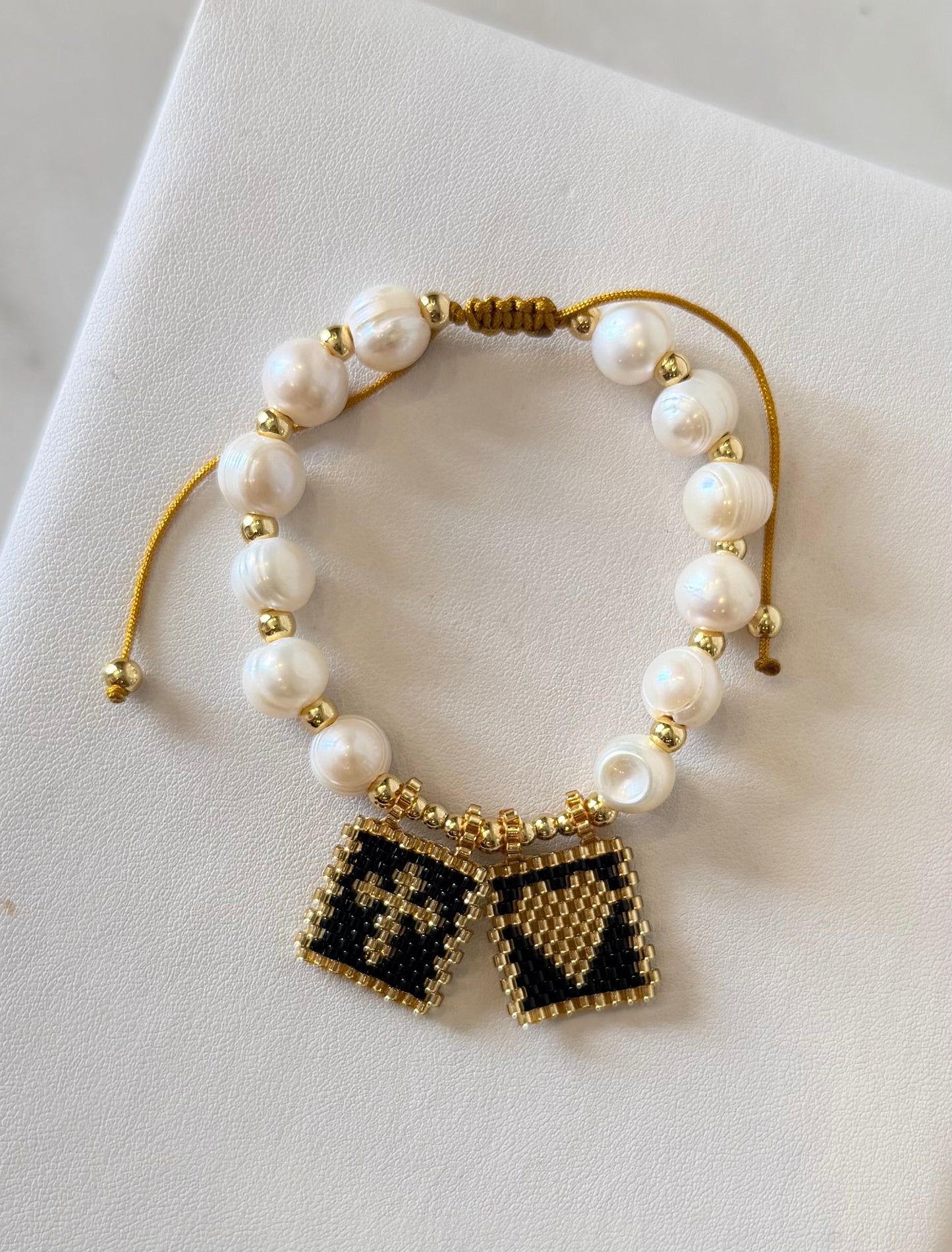 Escapulario de perlas